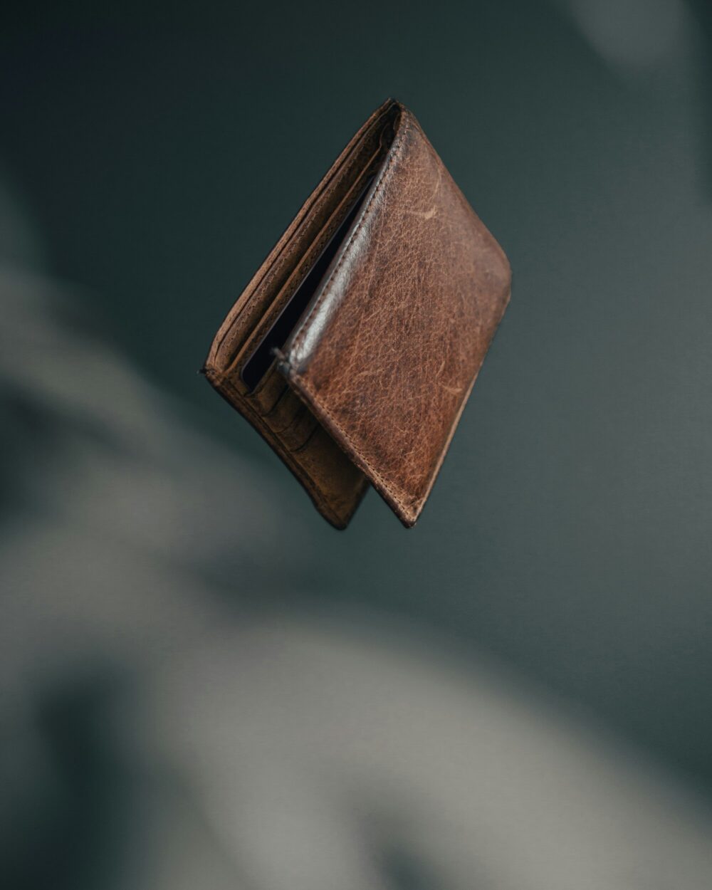 The bifold opened to show its card slots