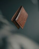The bifold opened to show its card slots