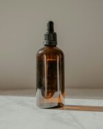 Close detail of the amber glass and collar