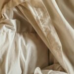 Close detail of creased undyed linen